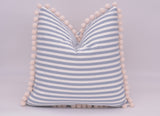 Pompom cushion with feather insert